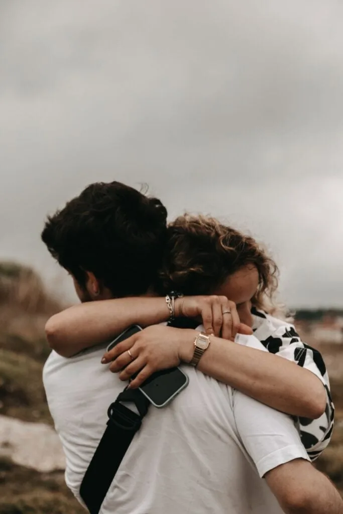 young couple embracing each other in a hug