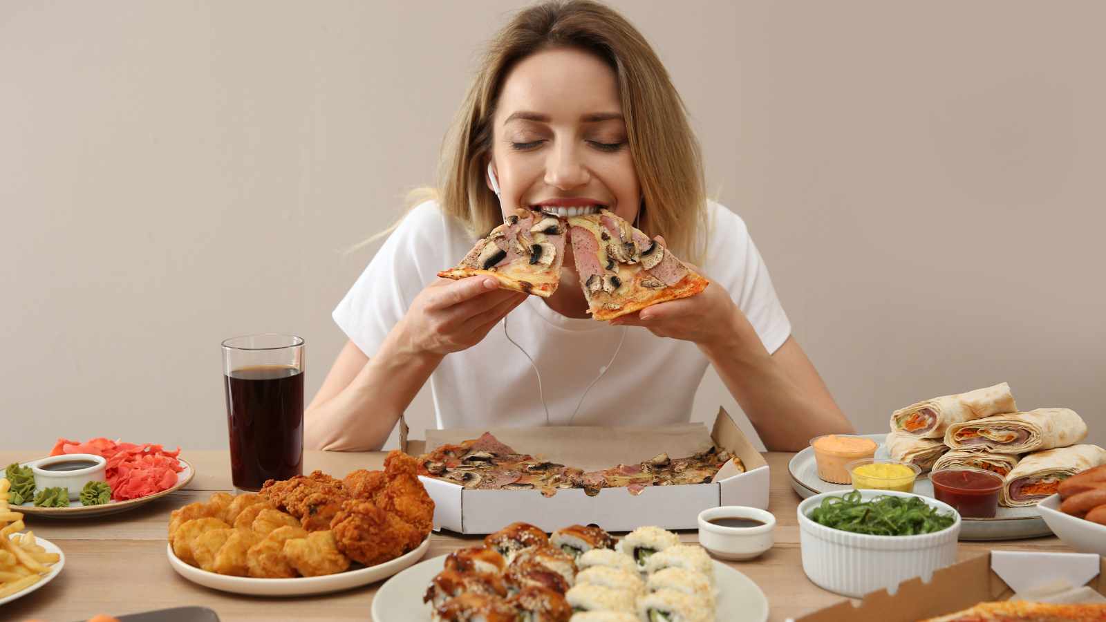 Lady eating a lot of food