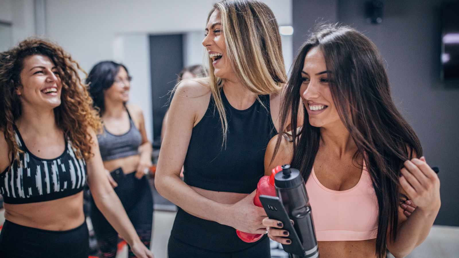 Ladies laughing in gym