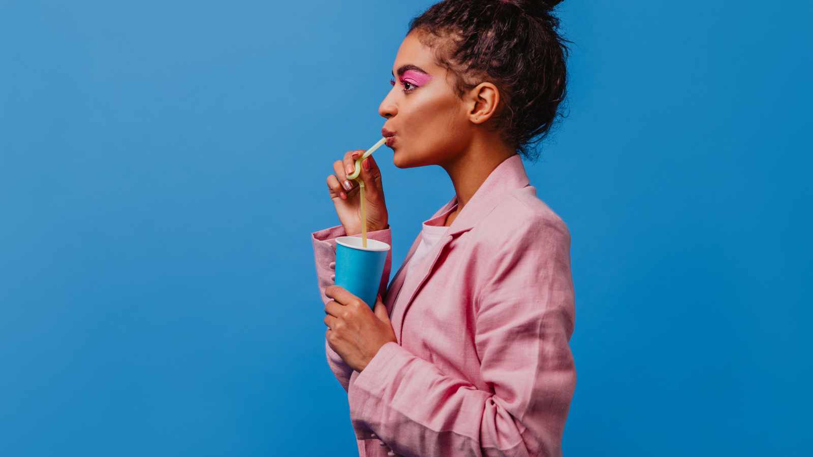 Lady drinking soda